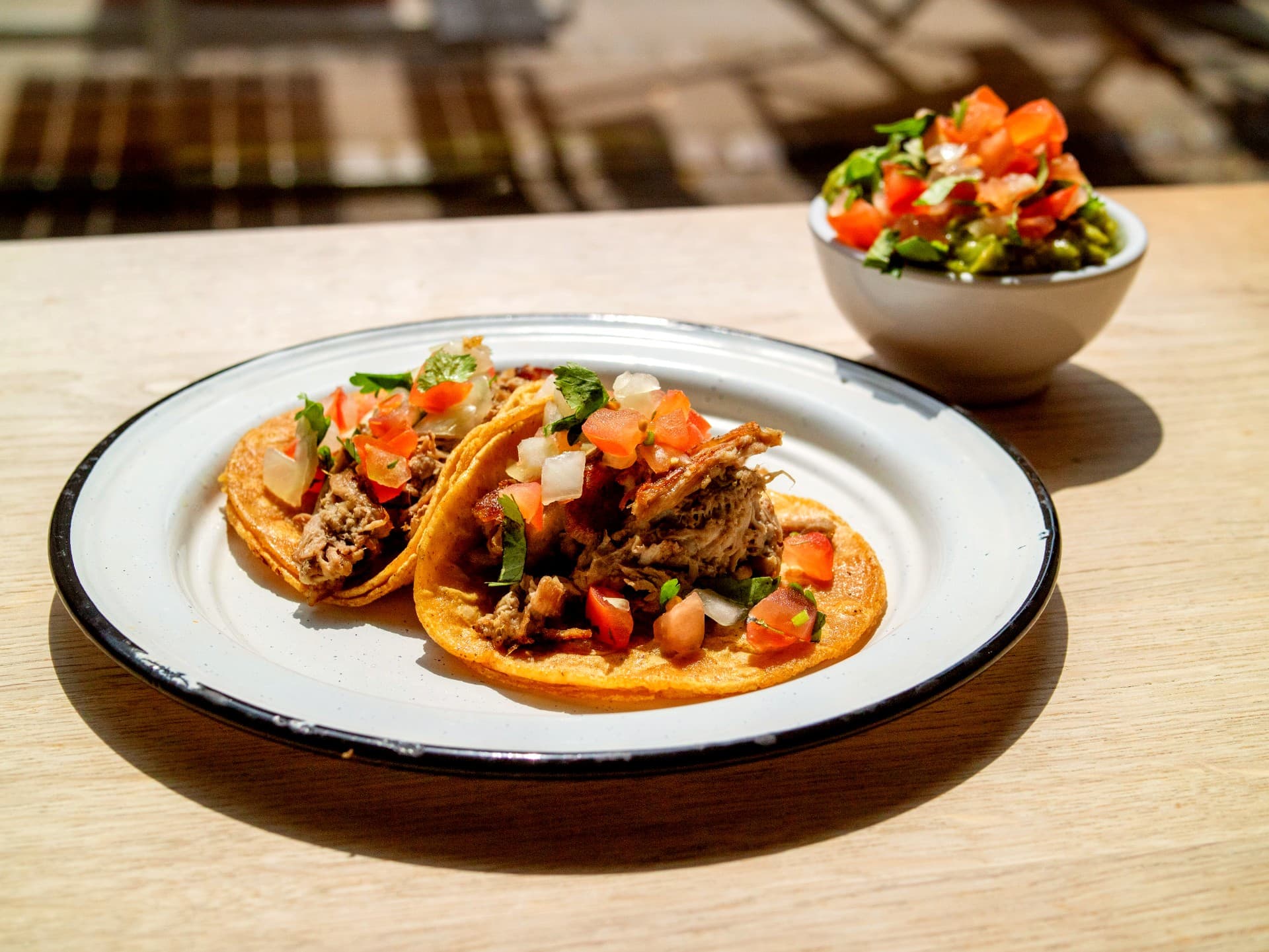 Plate with 2 carnitas tacos